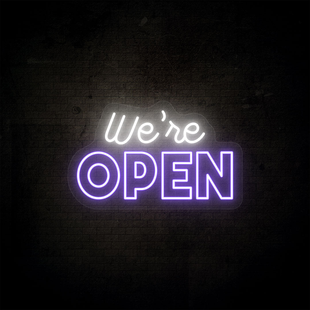 Vibrant LED "Open" neon sign for business display, glowing red and blue. Image 10 of 10.