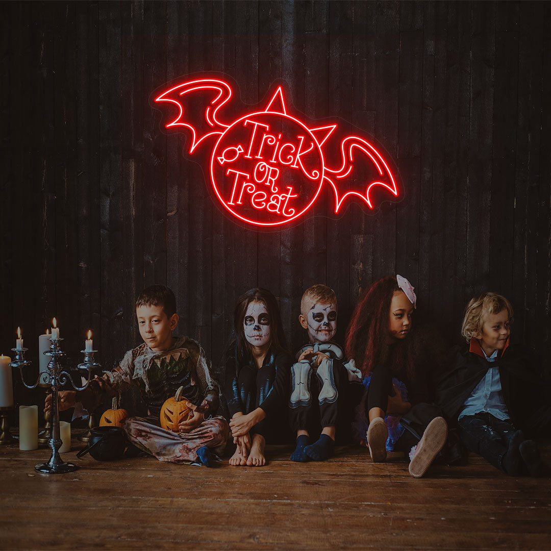Trick Or Treat With Wings Neon Sign