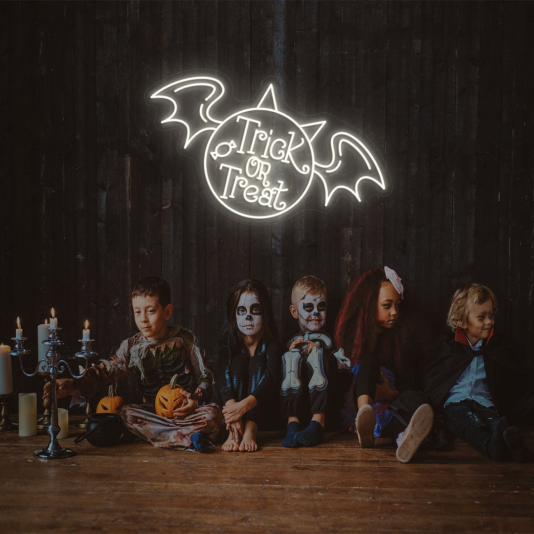 Trick Or Treat With Wings Neon Sign