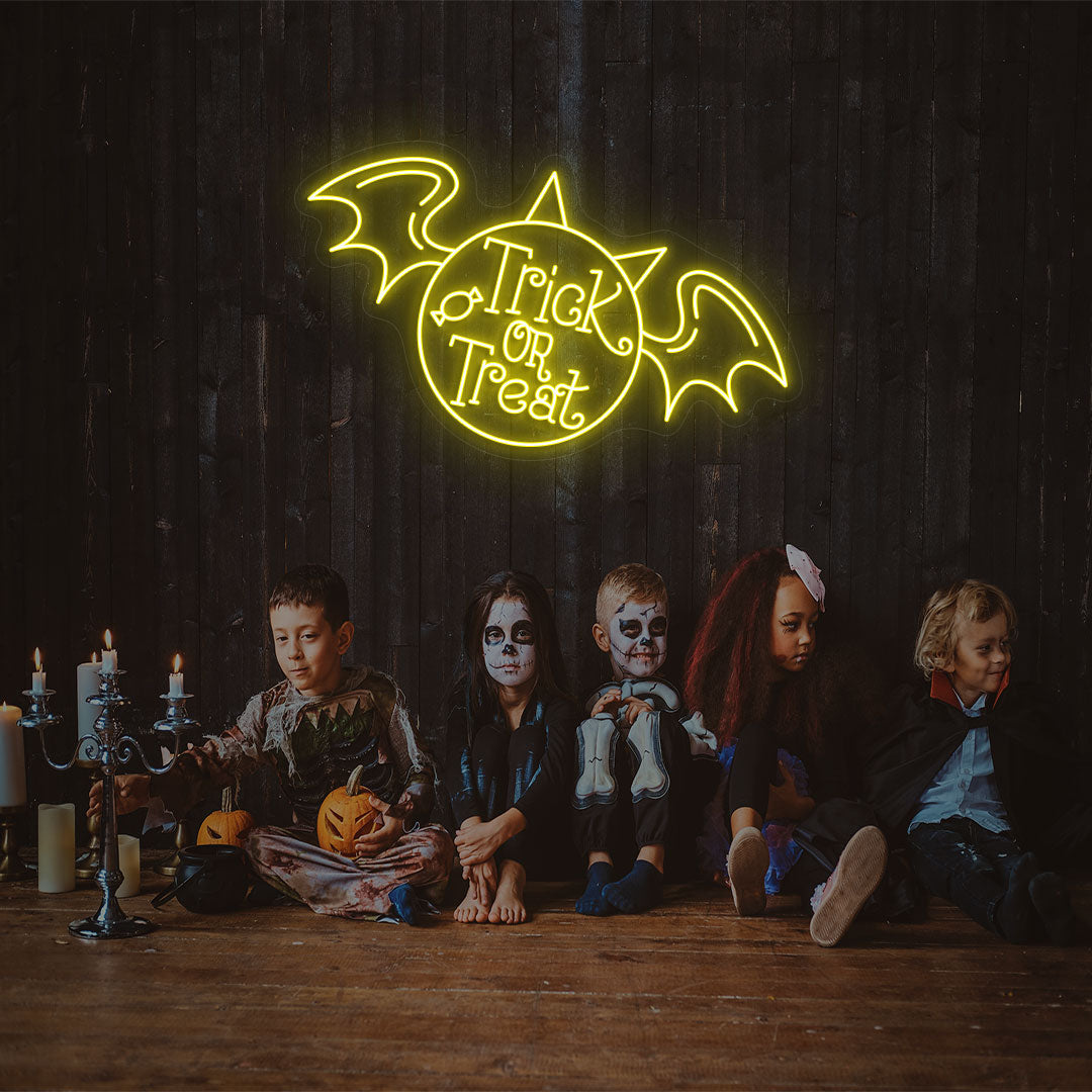 Trick Or Treat With Wings Neon Sign